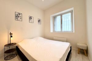 Appartements Joli T2 esprit loft design & confort : photos des chambres