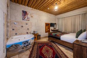 Queen Room with Spa Bath room in My Story Cave Hotel
