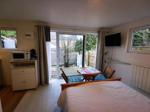 Appartements La petite cabane : photos des chambres