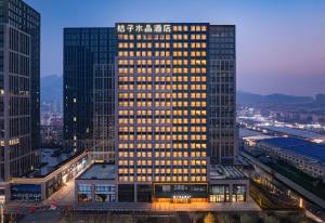 Orange Crystal Qingdao Liaoyang West Road Guoxin Sports Center Hotel - 4hvězdičkové hotely ve městě Čching-tao