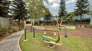 RoomQu at Ecohome Citra Raya