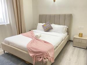 luxurious fully furnished three bedroom apartment with DSQ ,Gym, children play area, rooftop football pitch, coffee house, restaurant, garden in kilimani