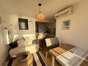 Appartements Appartement Cosy avec Vue Mer au 4e : photos des chambres