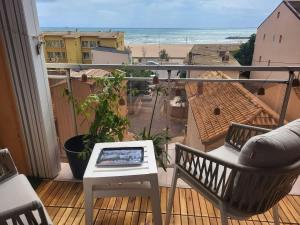 Appartements Appartement Cosy avec Vue Mer au 4e : photos des chambres