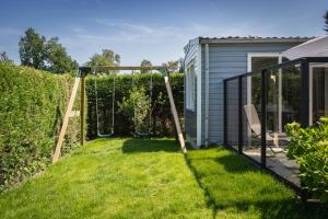 Stijlvol chalet Zeeland - Sauna & omheinde tuin VP082