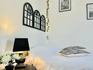 Appartements Tulipe 14 cocon romantique proche centre-ville : photos des chambres