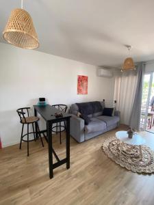 Appartements La palmeraie Evanlucas : photos des chambres