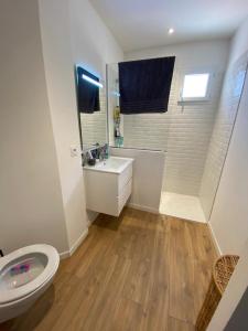 Appartements La palmeraie Evanlucas : photos des chambres