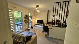 Appartements Royan - APPARTEMENT en rez-de-chaussee amenage avec ELEGANCE - jardin privatif : photos des chambres