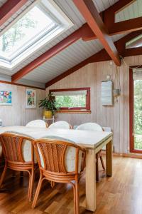 Traditional Home With Garden Near Water