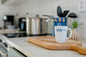 Quaint Barn Nestled Between Sea And Forest