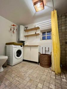 Be Surrounded By Trees In A Thatched Cottage