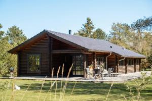 Authentic Log House Amid Evergreens In Vendsyssel
