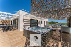 Appartement avec grande terrasse et spa à Lattes