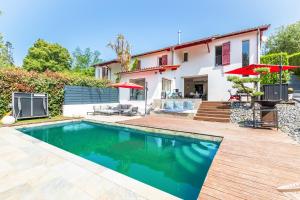 Maisons de vacances Villa Basoa - Villa avec piscine a 10 min plages : photos des chambres