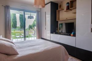 Appartements Rez de jardin d-exception sur les hauteurs de Nice : photos des chambres