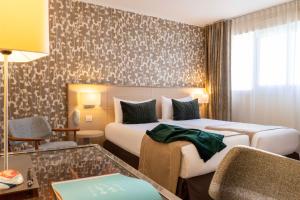 Hotels Jardins Eiffel : photos des chambres
