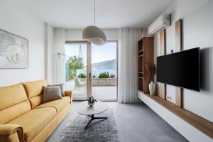 New Apartment with sea view terrace and pool