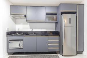 Apto 2 suites a poucos passos da av. principal.