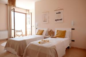 Sun-Filled Apartment, Breathtaking Coastal View, Gioiosa Marea, Limone by Ideal Sicily