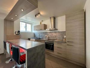 Appartements Le logis du chevalier saint-jean : photos des chambres