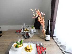 Geräumiges 2-Zimmer-Appartement für 4 Personen und schönem Gemeinschaftsgarten