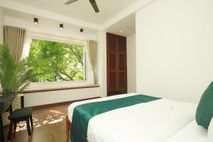 The Mira Villa West Lake by XÔI Residences