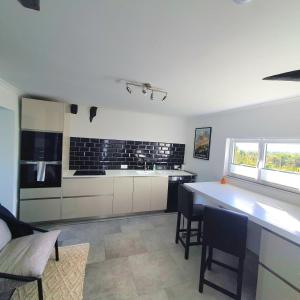 Maisons de vacances Tranquillity in a modern unit : photos des chambres