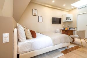Appartements Studio climatise & confortable - Paris 17 : photos des chambres