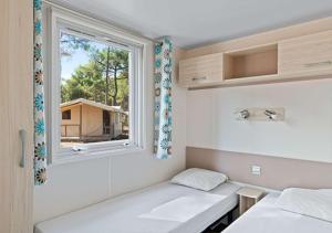 Campings Camping Les Salins de la Gardiole - Eurocamp I Homair : photos des chambres