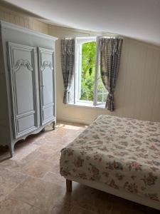 Maisons de vacances Gite en pierre 6 personnes avec piscine , entre Bergerac et Saint-Emilion : photos des chambres