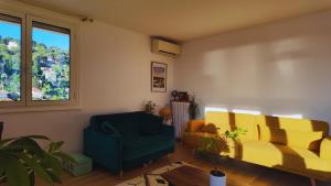 Appartements Le Grand Bleu : photos des chambres