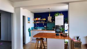 Appartements Le Grand Bleu : photos des chambres