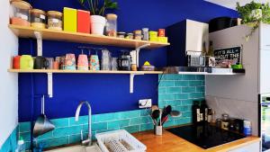 Appartements Le Grand Bleu : photos des chambres