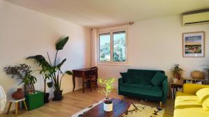 Appartements Le Grand Bleu : photos des chambres