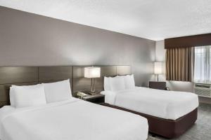 Queen Room with Three Queen Beds room in Clarion Hotel Seatac
