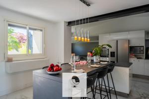 Villas Superbe villa climatisee avec parking et piscine : photos des chambres