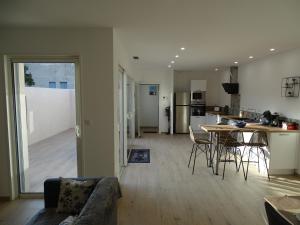 Appartements Location saisonniere a Saint-Thibery - Appartement 88 m2 avec terrasse et garage : photos des chambres