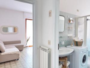 One-Bedroom Apartment with Balcony and City View