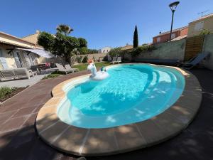Villas Superbe Villa climatisee avec piscine : photos des chambres