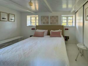 Historic Thatched House From 1750 In Husby