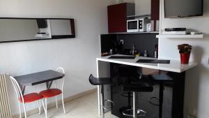 Appartements Appart Le Massillon Arenes Centre : photos des chambres