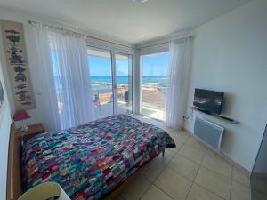 Appartements Spacious air-conditioned duplex with 270 degree sea views : photos des chambres