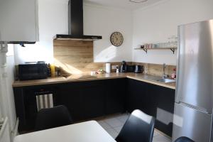 Appartements La Parisienne - 80m2 : photos des chambres