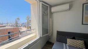 Appartement neuf - Vue Port - Clim - À pied de tout