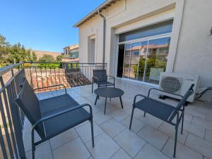 Appartements ColorChic 3 etoiles - Parking Prive Terrasse Clim - 120m2 Plein centre : photos des chambres