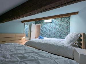 Appartements ColorChic 3 etoiles - Parking Prive Terrasse Clim - 120m2 Plein centre : photos des chambres