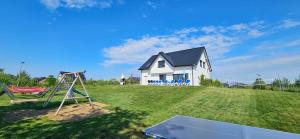 Villa Koprowo - mit direktem Seezugang, Sauna & Whirlpool