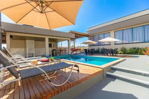 Charmosa Casa c 3 suítes e Piscina com Hidro