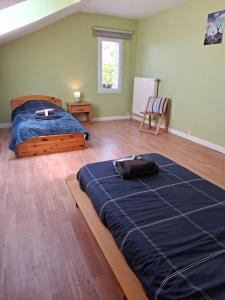 Maisons de vacances Grande maison spacieuse pour 9 personnes : photos des chambres